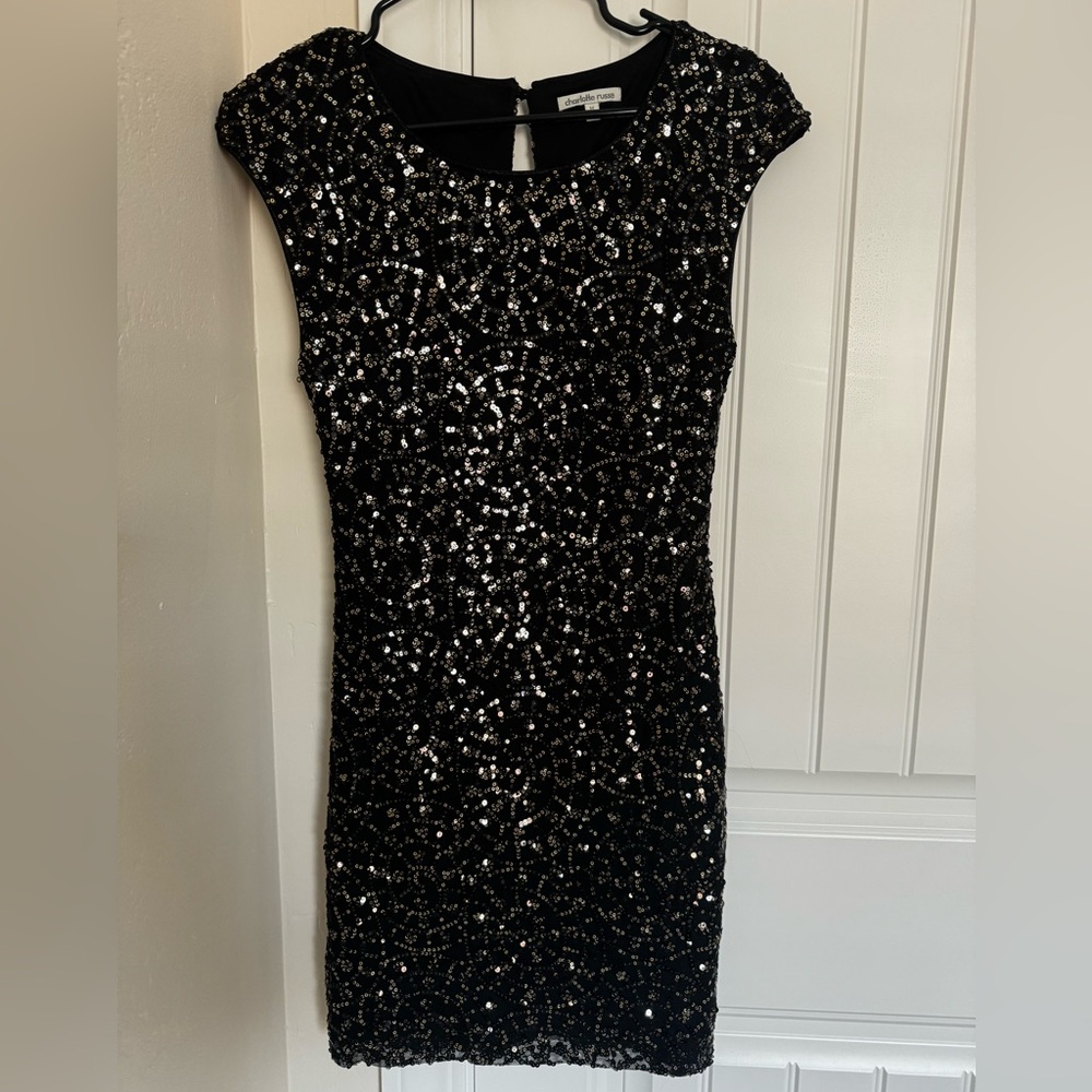 Black with gold sequins dress. Great condition.
